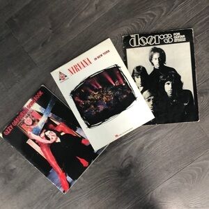 Vintage song/guitar OZZY,NIRVANA,and THE DOORS books